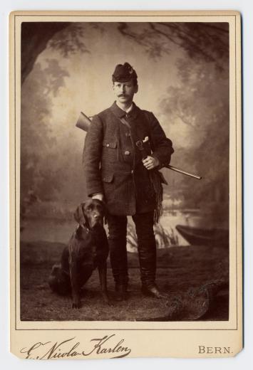 Jules Bloesch (1844-1892) mit geschultertem Gewehr und Hund by Nicola-Karlen Emil