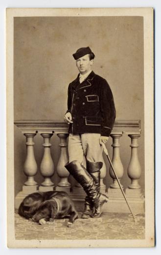 Jules Bloesch (1844-1892) en chasseur avec bâton et chien by Wolff & Nicola