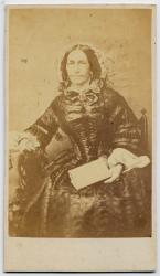 Joséphine Schwab-Verdan (1805-1880) assise de face avec un livre by Willemin Henry